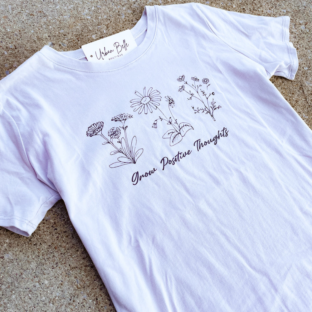 
                      
                        Grow Positive Thoughts Graphic Tee
                      
                    